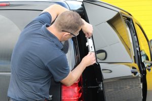 phil-fitting-a-deadlock-to-a-van