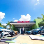 Kuching rent a car service welcoming customers with a variety of rental vehicles outside a modern agency.