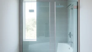 Showcase stylish shower doors UK in a modern bathroom with sleek design and natural light.
